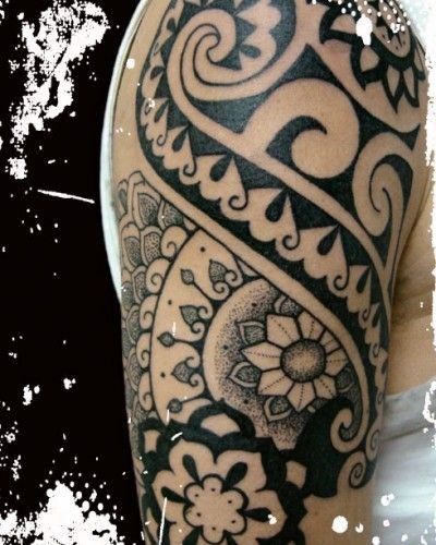 Tatuaje de maorí en el brazo