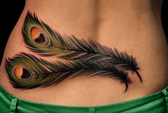 Lovely colorful peacock feathers tattoo for girls