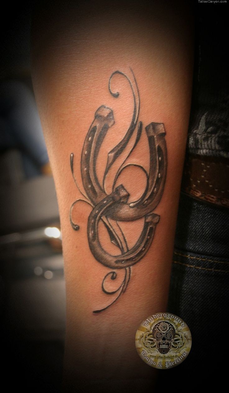 Lovely elegant two lucky horseshoe tattoo
