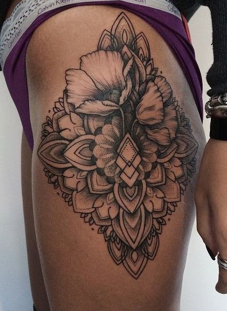 Lovely floral patterns tattoo on hip