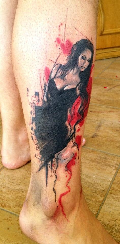 Lovely girl in black dress pin up tattoo on leg by Adam Kremer