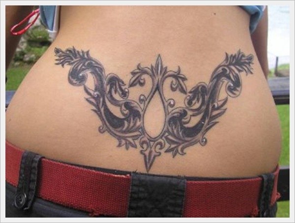 Lovely patterns tattoo on lower back