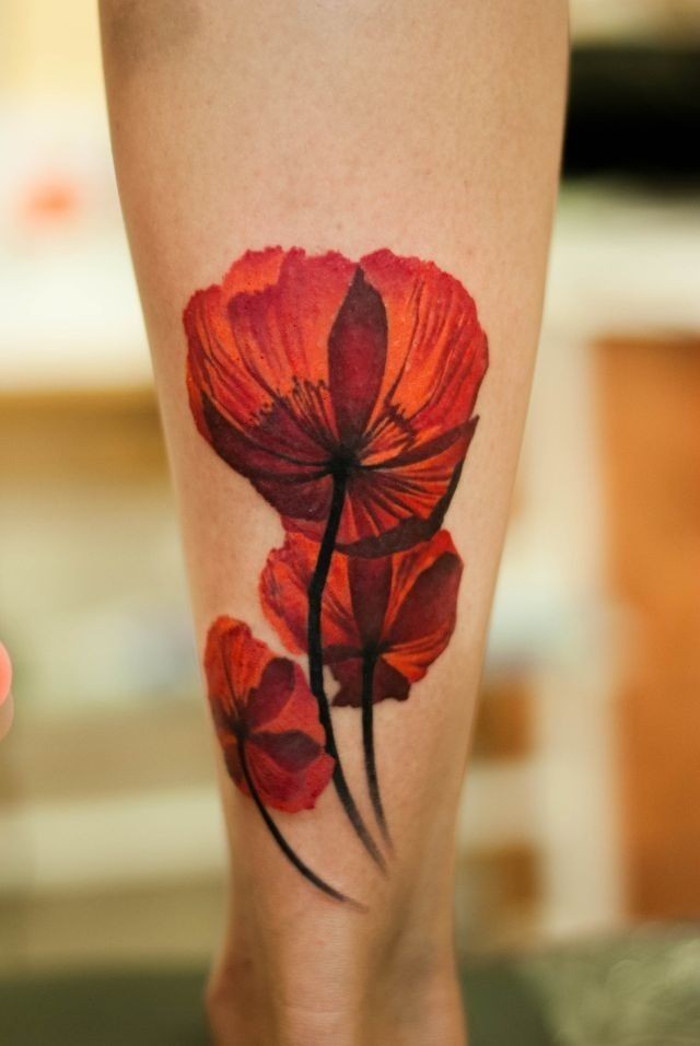 Lovely red poppies tattoo