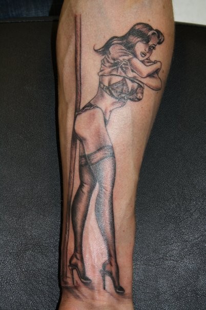 Lovely sexy pin up girl in stockings forearm tattoo