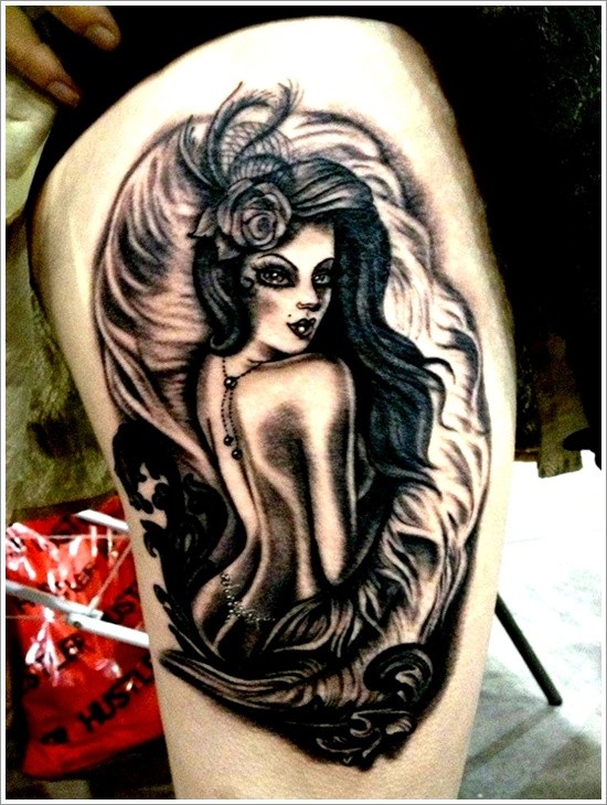 Lovely sexy pin up girl tattoo on thigh