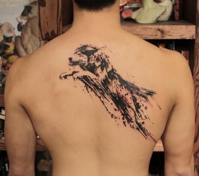 Lovely watercolor big leaping wolf tattoo on back