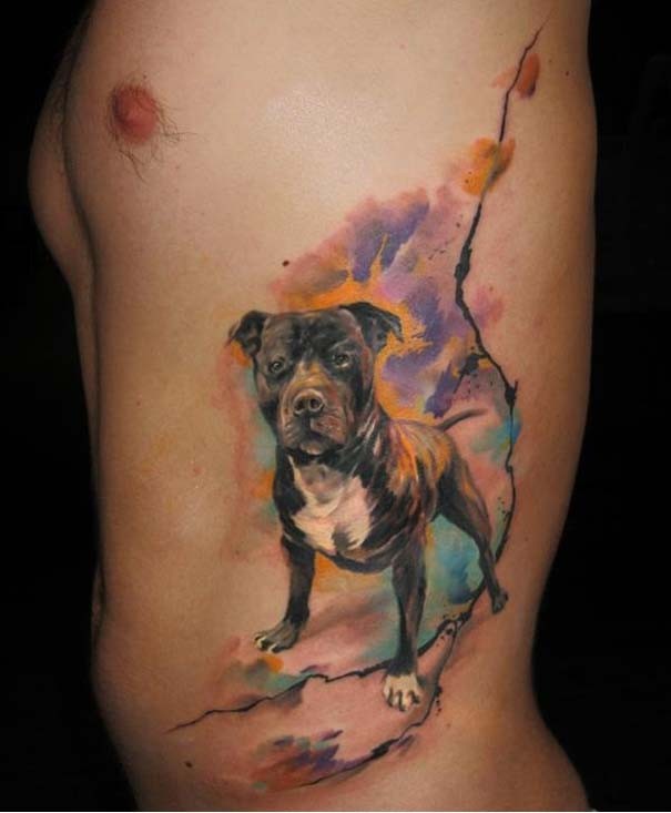 Lovely watercolor dog tattoo on ribs