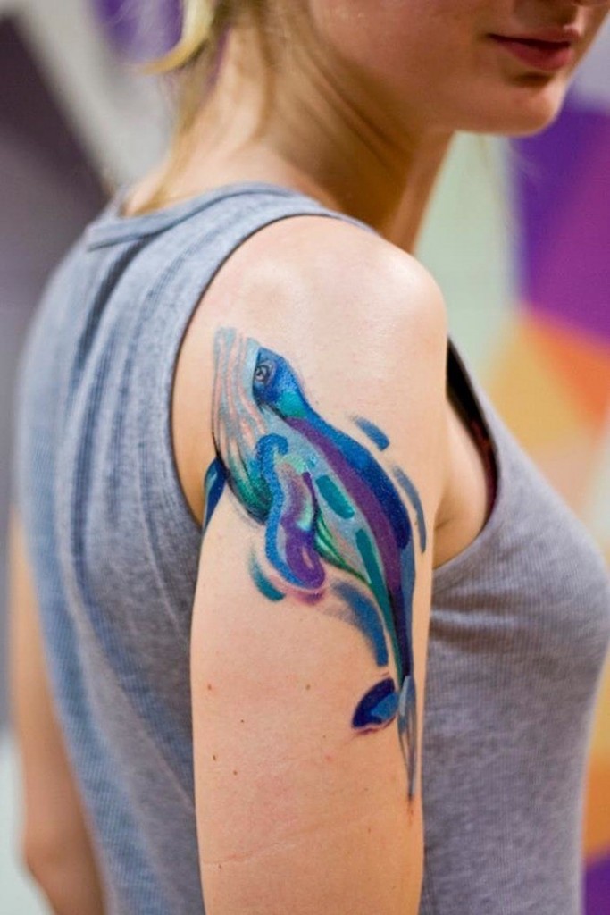 Lovely watercolor dolphin tattoo for girls