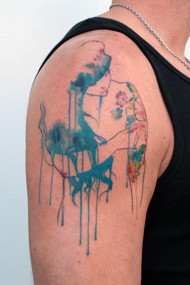 Lovely watercolor girl tattoo on shoulder