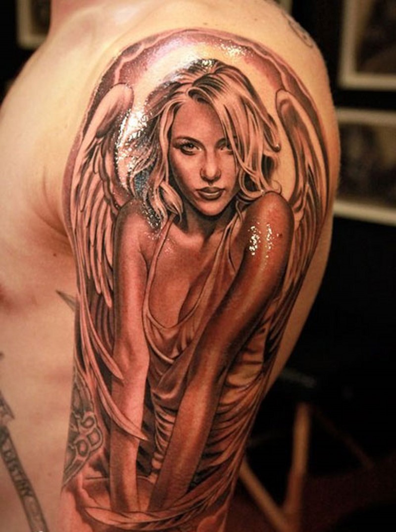 Lovely woman angel tattoo on  arm