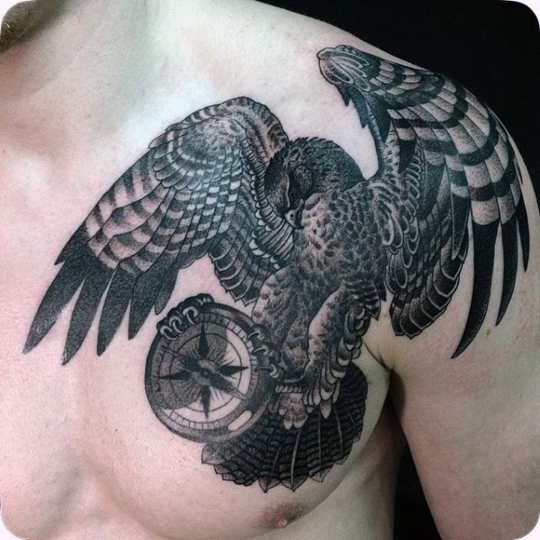 Magnificent designed black and white detailed eagle with compass tattoo on chest