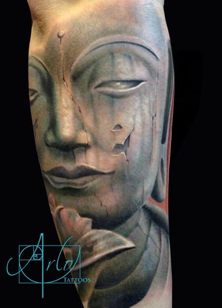 Magnificent detailed and colored old forearm tattoo of Buddha statue