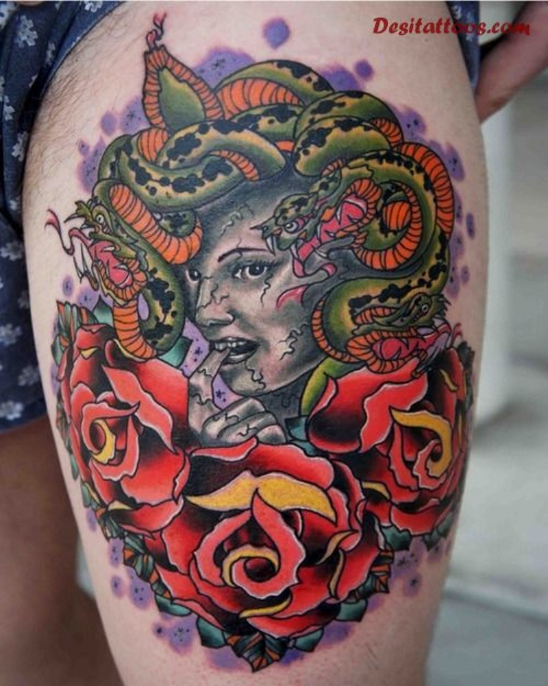 Magnificent looking colored modern style Medusa portrait tattoo on thigh with old style rose flowers