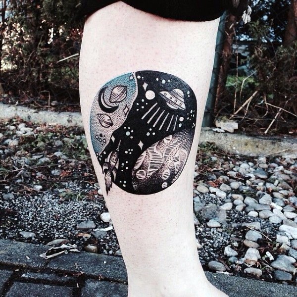 Magnificent multicolored various ships in space tattoo on leg