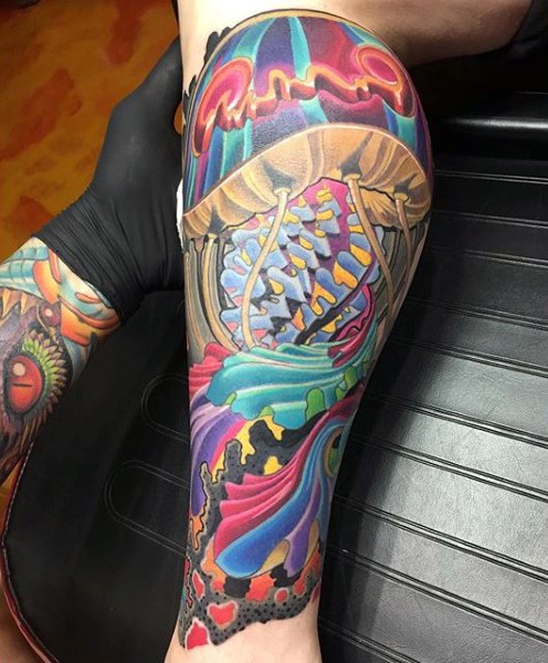Magnificent painted and detailed awesome jellyfish tattoo on leg