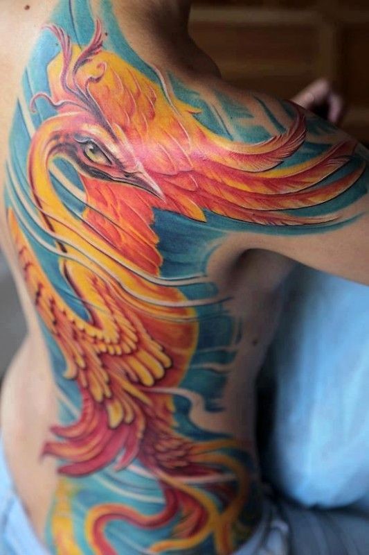 Magnificent phoenix tattoo on ribs
