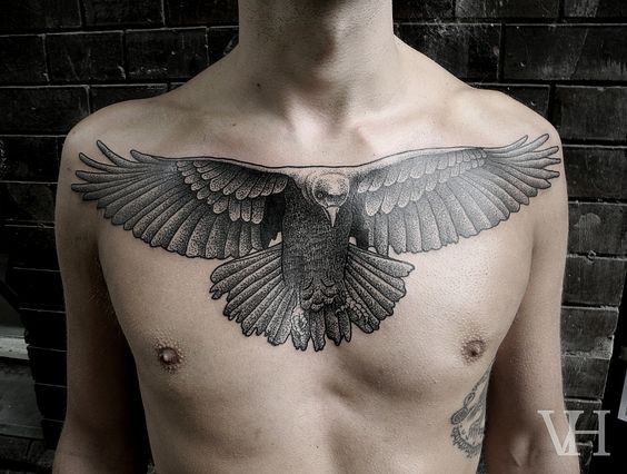 Magnificent vintage style black and white chest tattoo on flying eagle