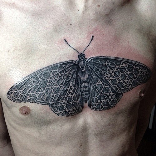 Man chest moth gray ink tattoo
