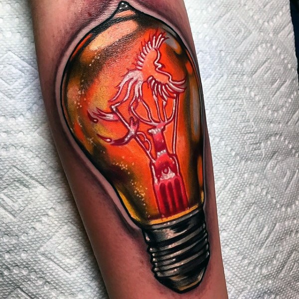 Marvelous 3D style very detailed bulb tattoo on forearm with phoenix bird