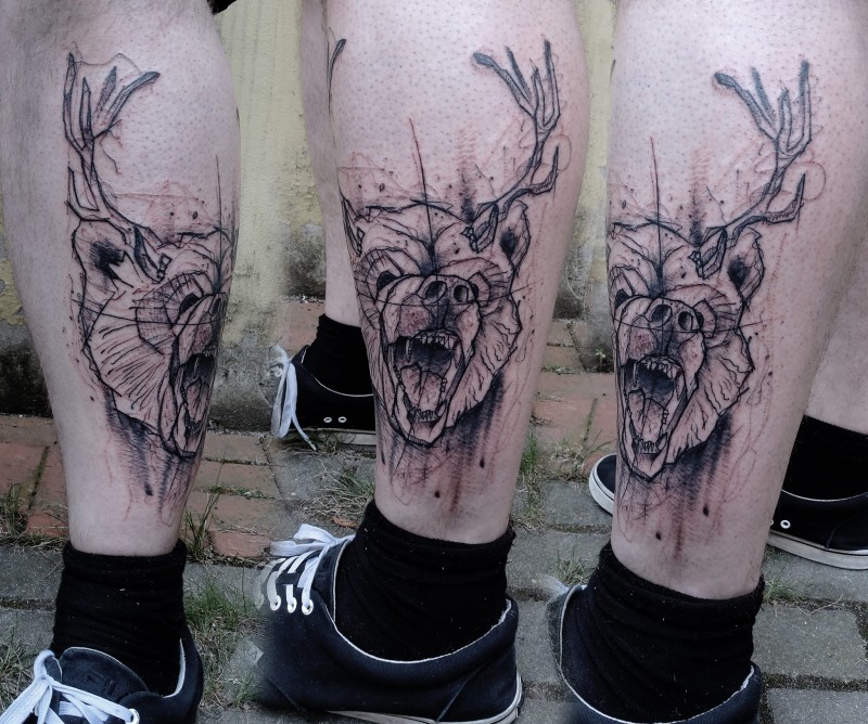 Marvelous black ink leg tattoo of bear head with deer horns