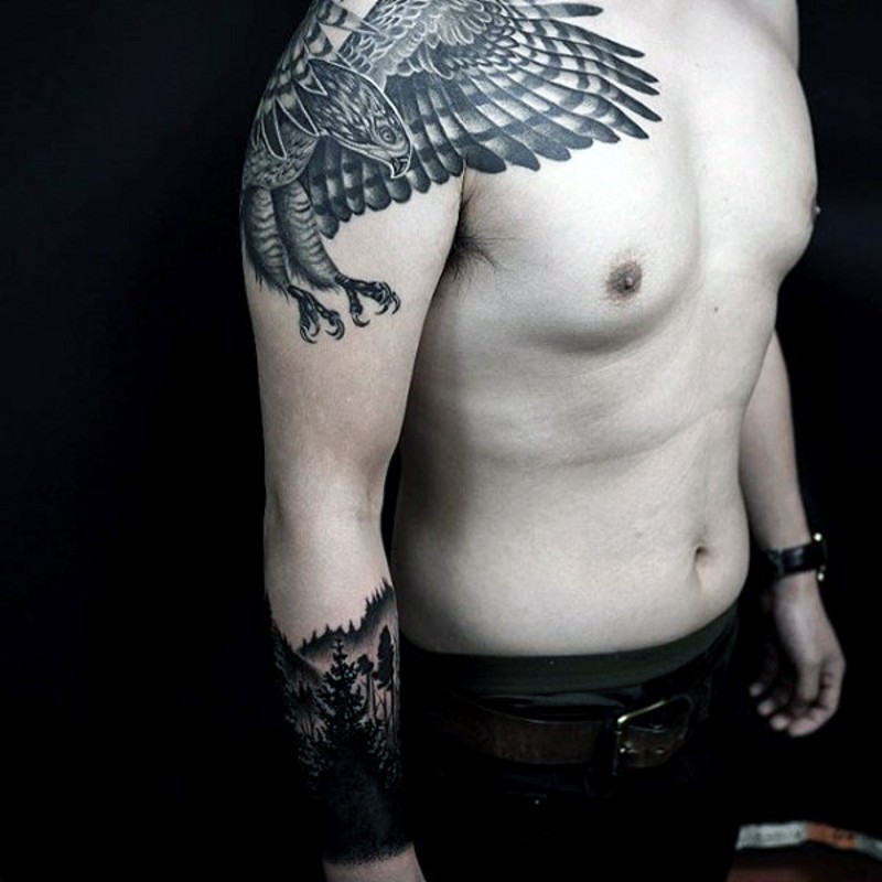 Marvelous black ink shoulder tattoo of flying eagle