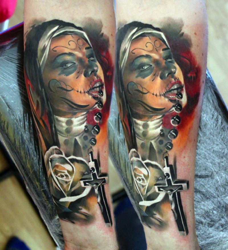 Marvelous colored forearm tattoo of creepy Mexican woman with cross