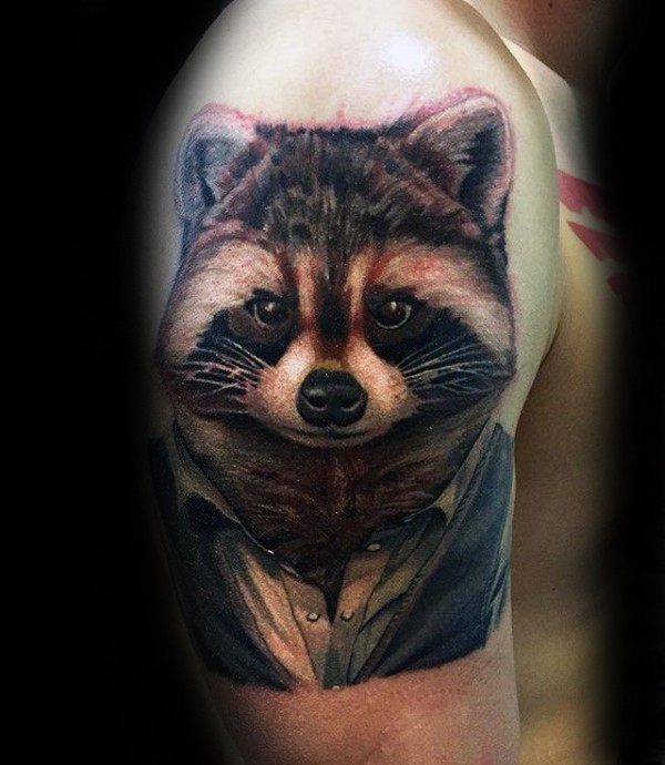 Marvelous colored shoulder tattoo of raccoon with shirt