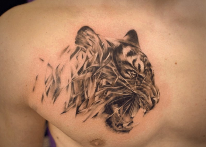 Marvelous tiger head tattoo on chest for men
