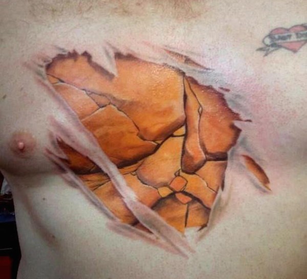 Marvelous very detailed colored chest tattoo with rock muscles