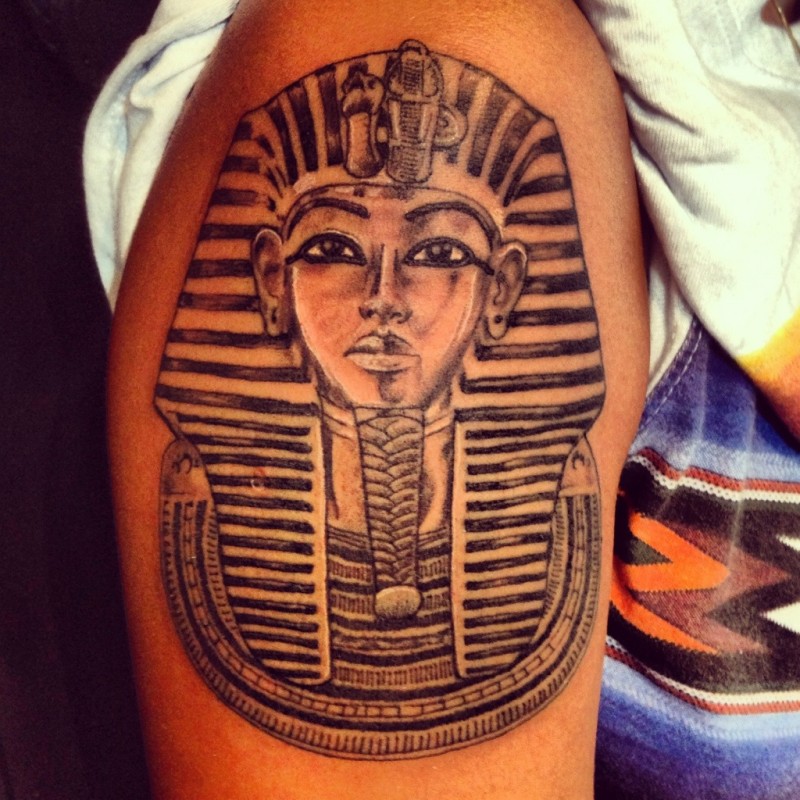 Mask of pharaoh tattoo on arm