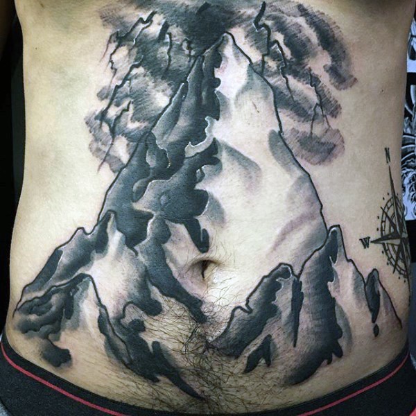 Massiver schwarzer und weißer großer Berg Tattoo am Bauch