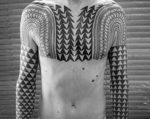 Massive black and white tribal geometric ornaments tattoo on sleeve and chest