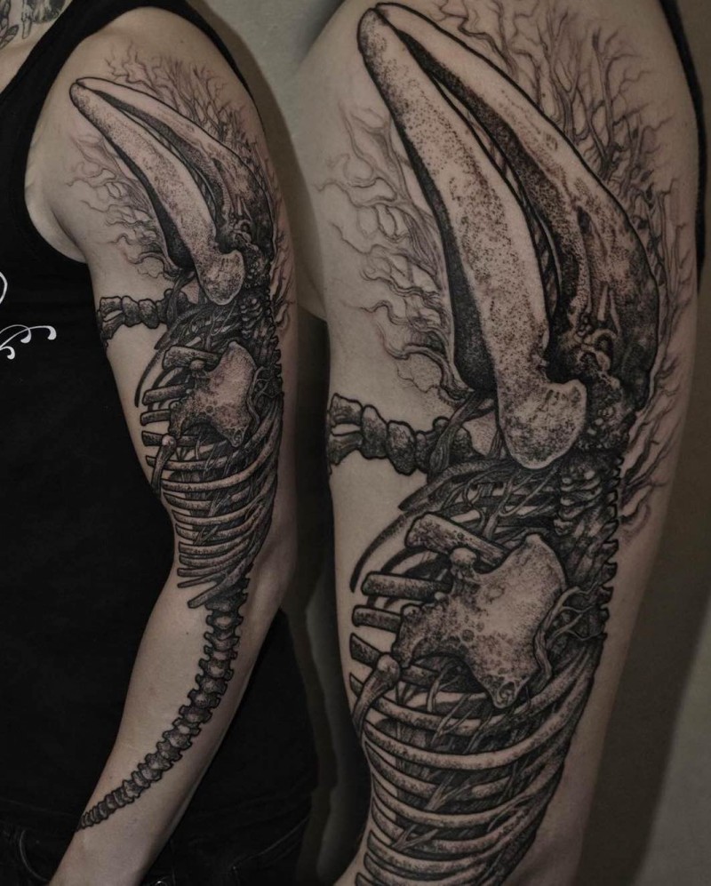 Massive black and white very detailed sleeve tattoo of armadillo skeleton