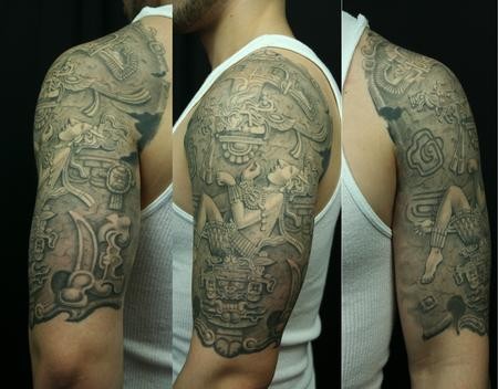 Massive stonework style shoulder tattoo of ancient wall statue