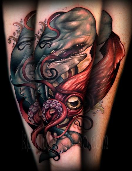 Massive very detailed colorful whale and squid tattoo on sleeve area