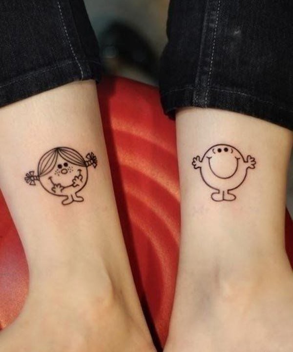 Matching cute friendship tattoos on legs