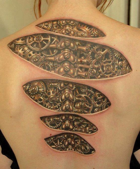 Mechanisms under skin tattoo on back