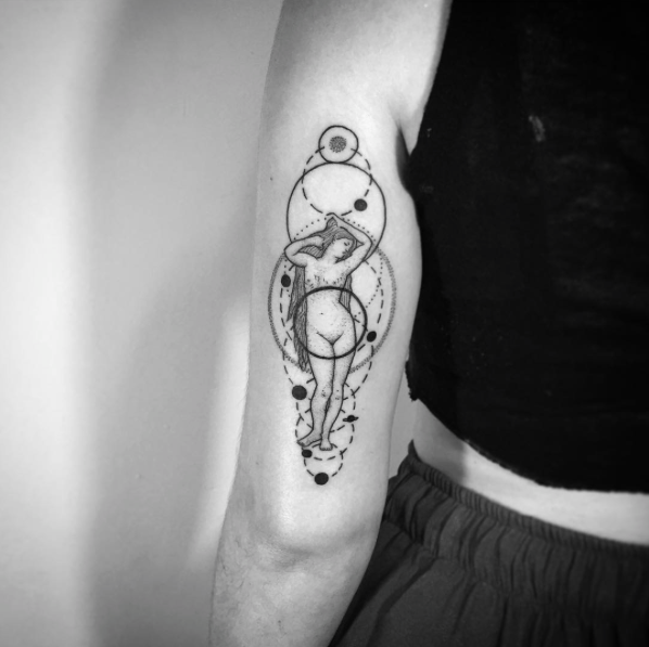 Medium size black ink arm tattoo of mystical woman with circles