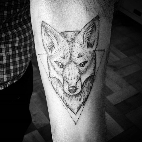 Medium size black ink steady fox tattoo on forearm with triangle