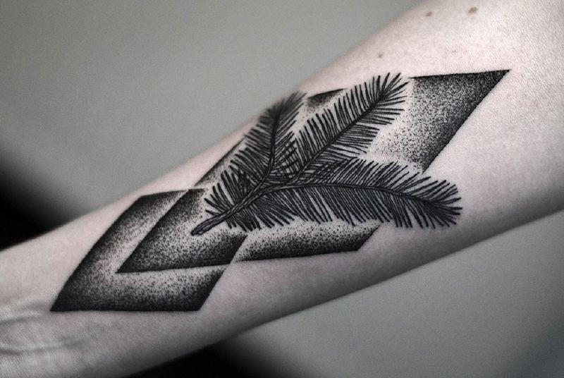 Medium size black ink stippling style forearm tattoo of tree branch and geometric figures