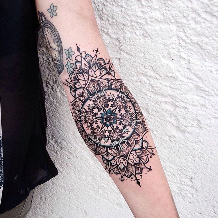 Medium size colored forearm tattoo of beautiful flower