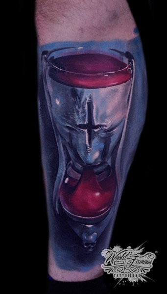 Medium size colored leg tattoo of bloody sand clock