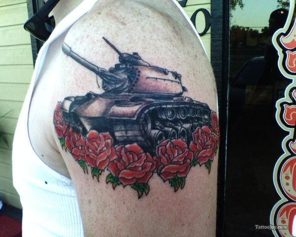 Medium size colored shoulder tattoo of American tank with flowers