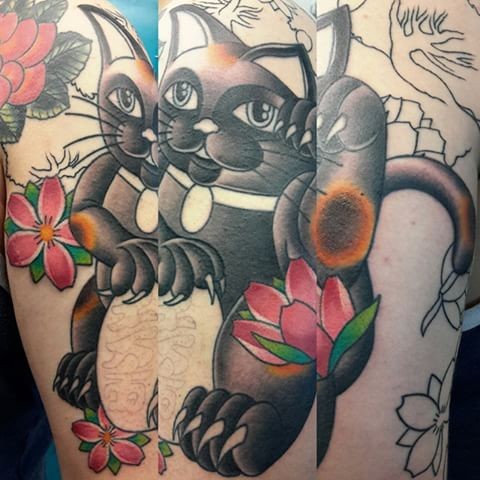 Medium size detailed thigh tattoo of maneki neko japanese lucky cat and flowers
