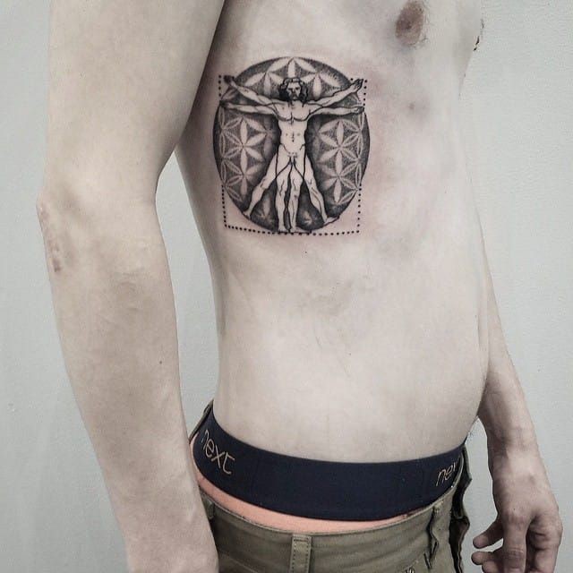 Medium size dot style side tattoo of Davincies Vitruvian man
