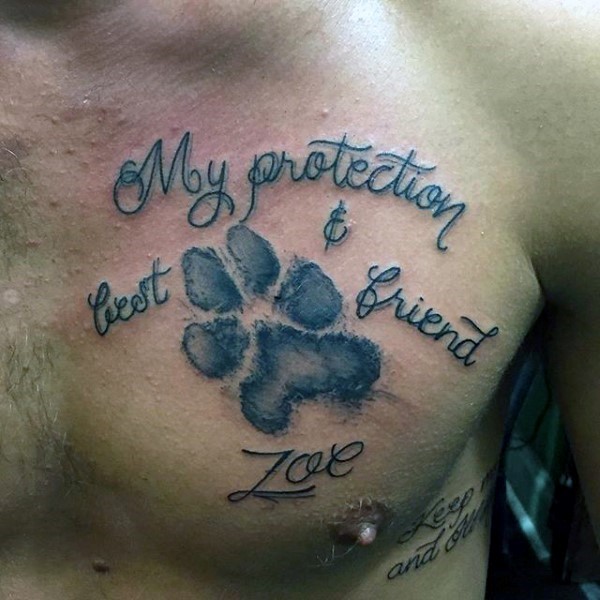 Memorial style black ink chest tattoo of animal paw print with lettering
