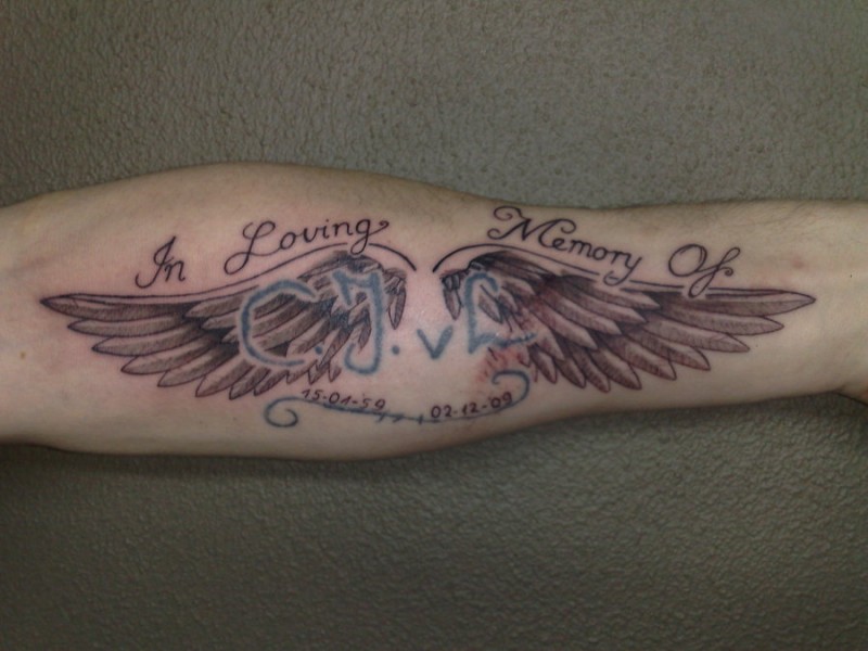 Memory wings tattoo on arm for men