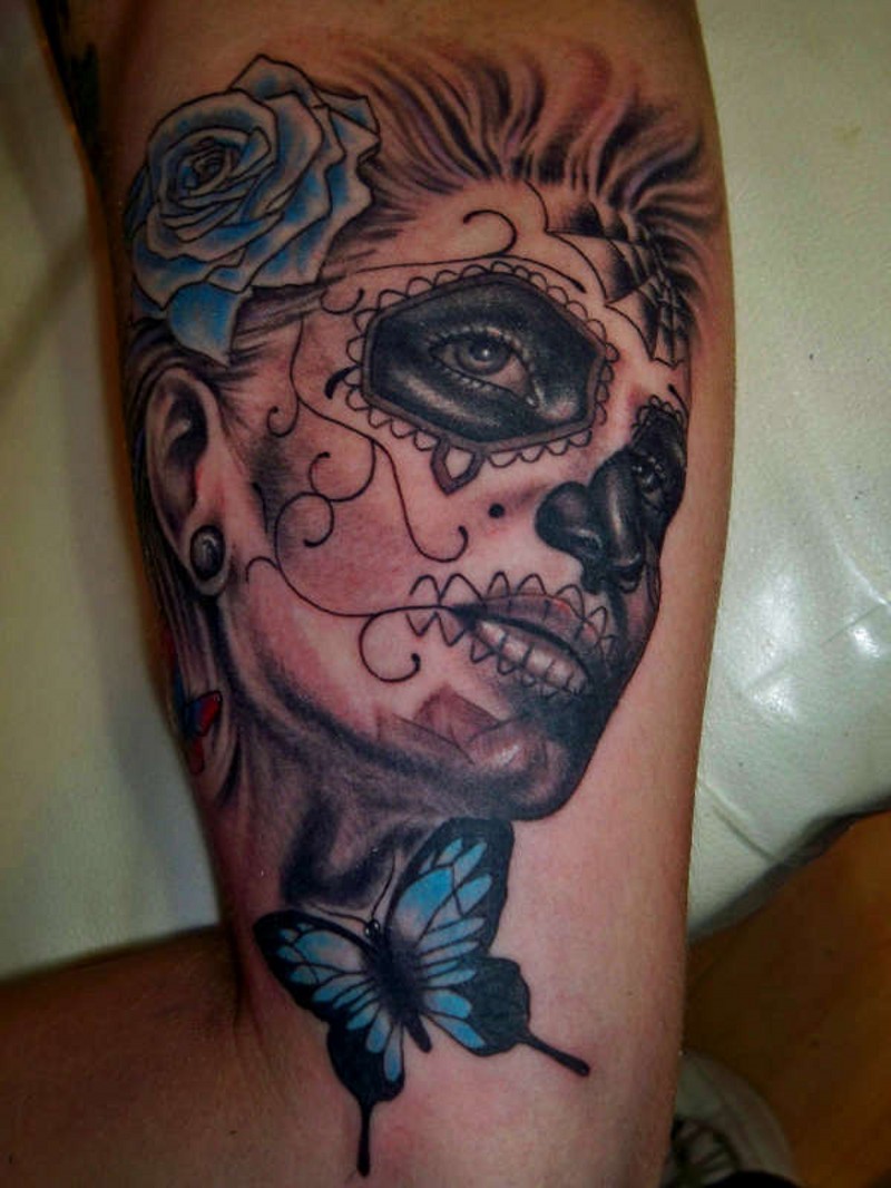 Mexican skull girl and blue butterfly and rose tattoo