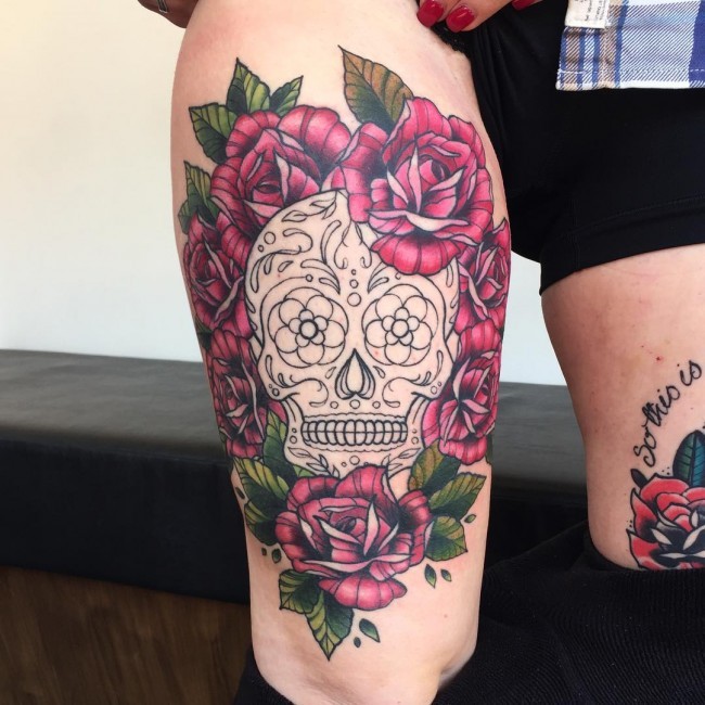 Mexican style black and white skull tattoo with roses
