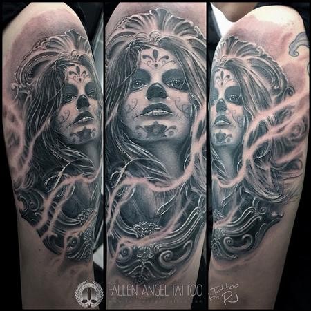 Mexican style detailed shoulder tattoo of woman face with smoke